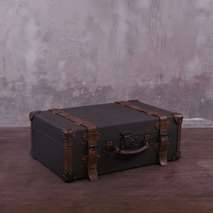 Vintage canvas and genuine leather side table suitcase trunk 1920s conceptual design.