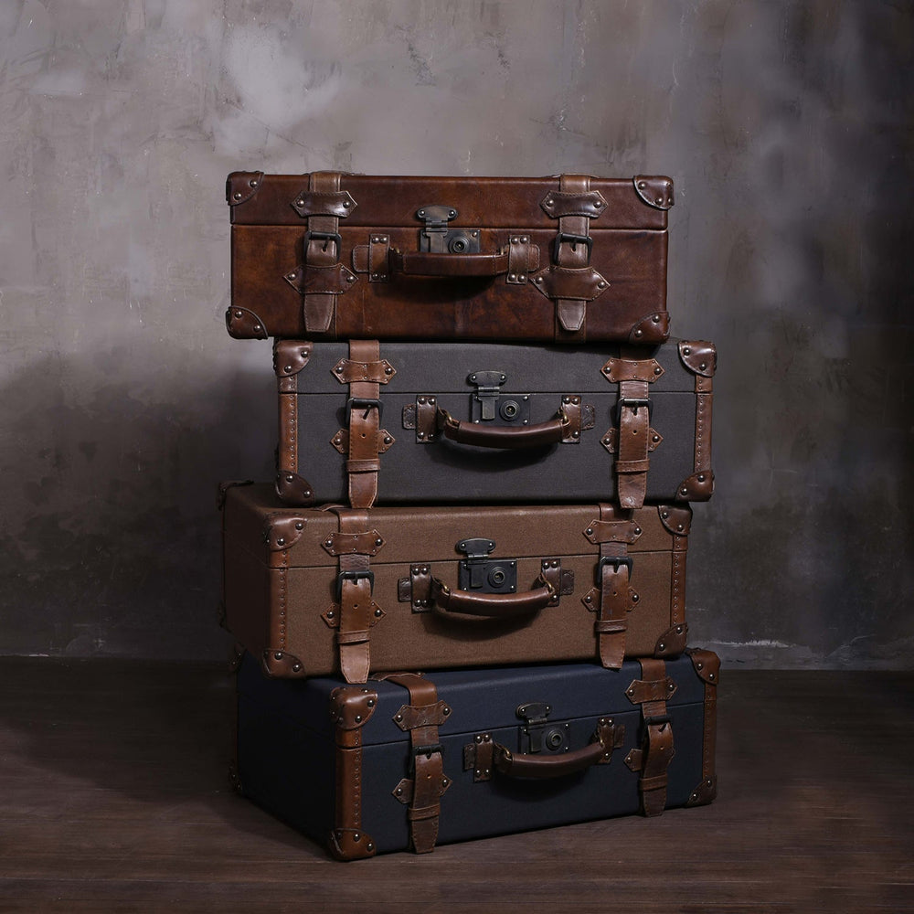 Vintage canvas and genuine leather side table suitcase trunk 1920s primary product view.