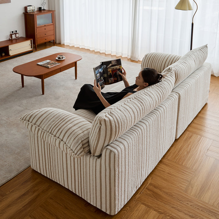 Vintage chenille velvet fabric 3 seater sofa koala in still life.
