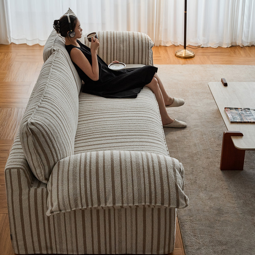 Vintage chenille velvet fabric 4 seater sofa koala in close up details.