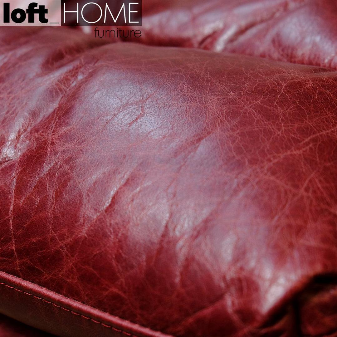 Vintage genuine leather 1 seater sofa bardo in panoramic view.