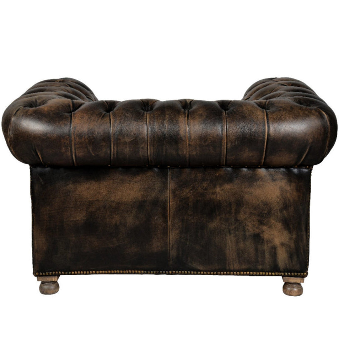 Vintage genuine leather 1 seater sofa chesterfield button with context.