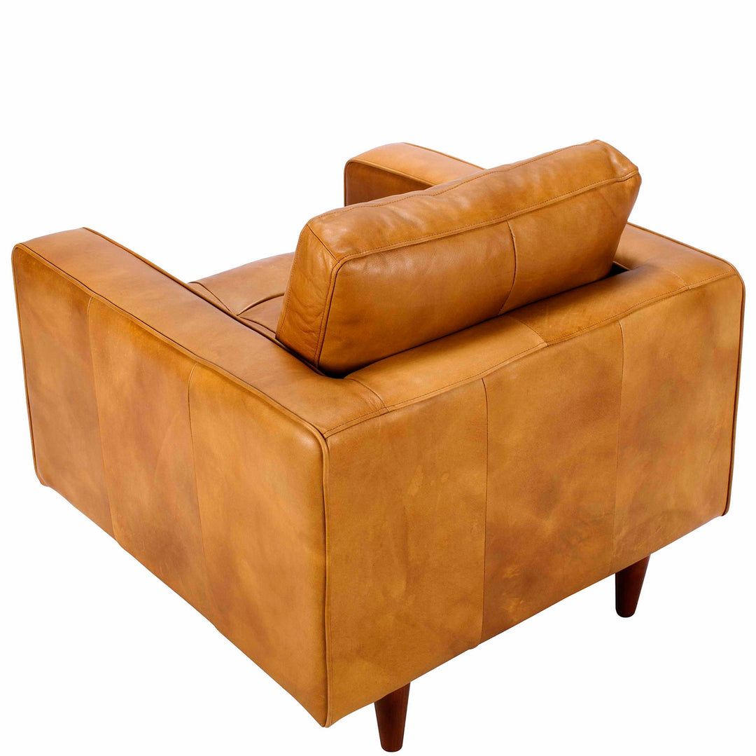 Vintage genuine leather 1 seater sofa olga with context.