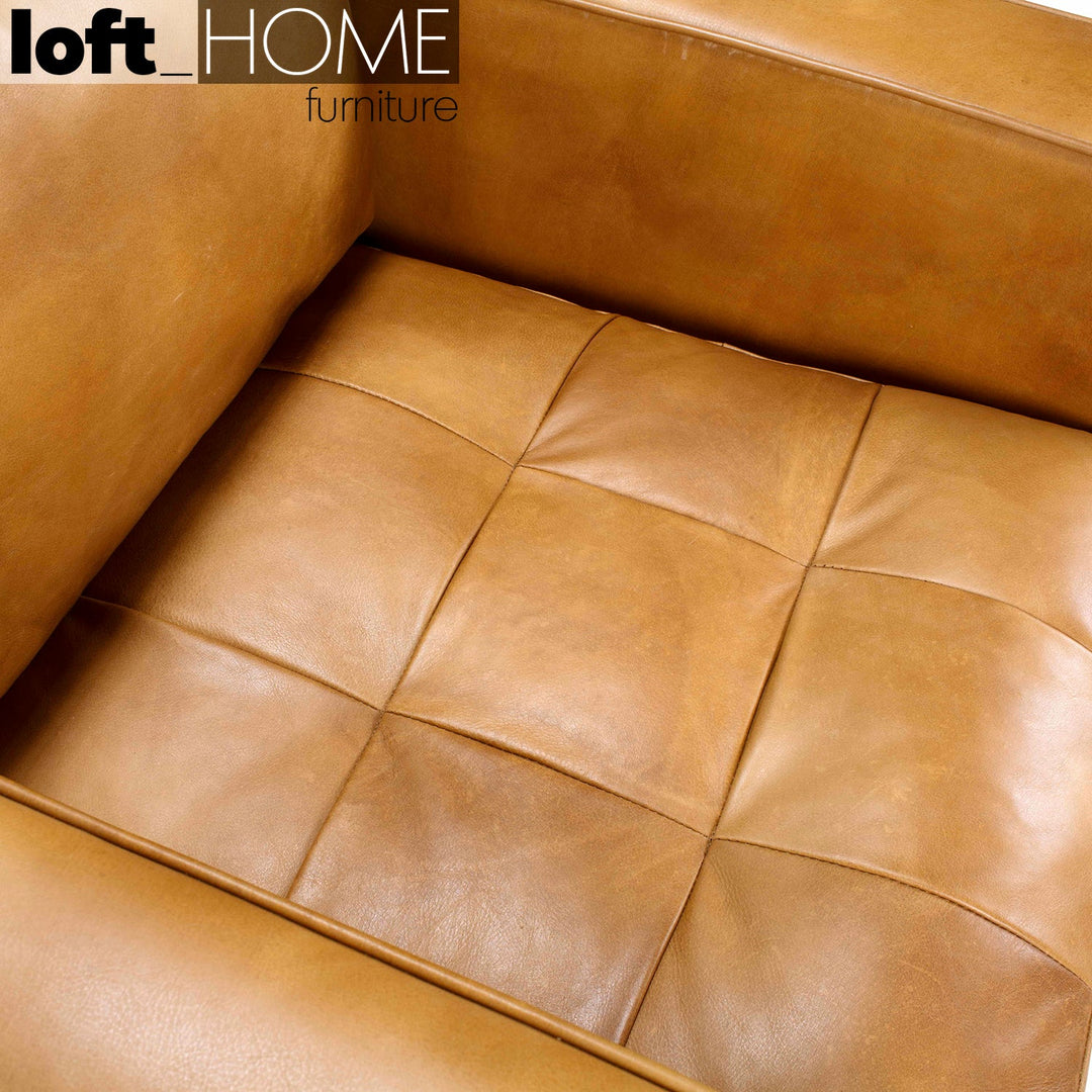 Vintage genuine leather 1 seater sofa olga in close up details.