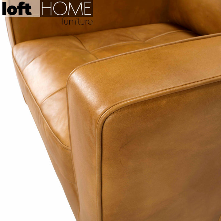 Vintage genuine leather 1 seater sofa olga in panoramic view.