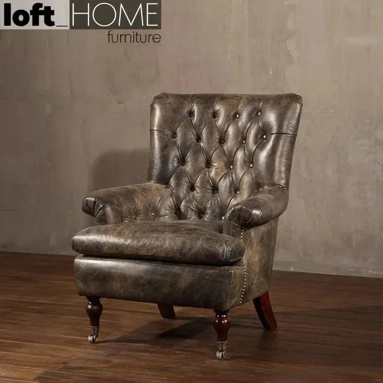 Vintage genuine leather 1 seater sofa retro in panoramic view.