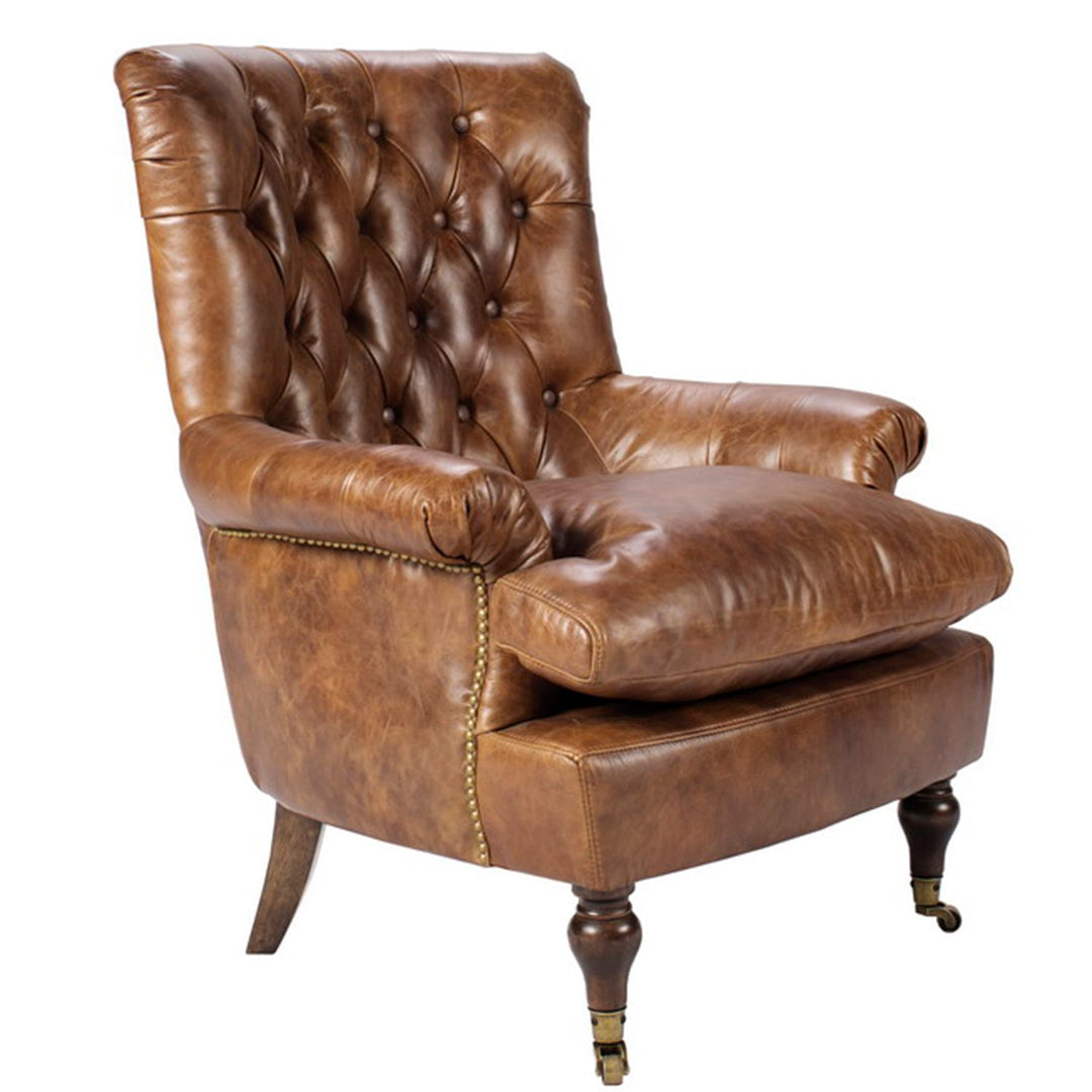 Vintage genuine leather 1 seater sofa retro in still life.