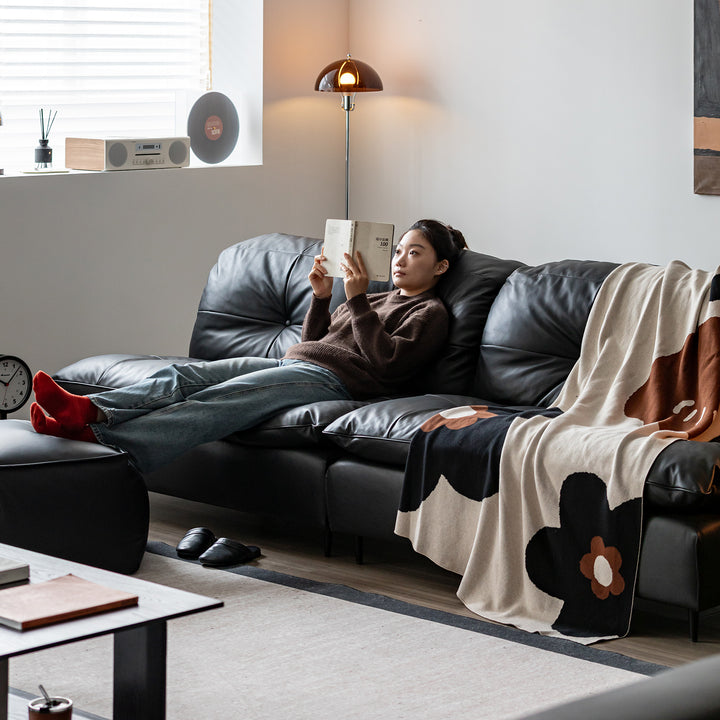 Vintage genuine leather 1 seater sofa riga with context.