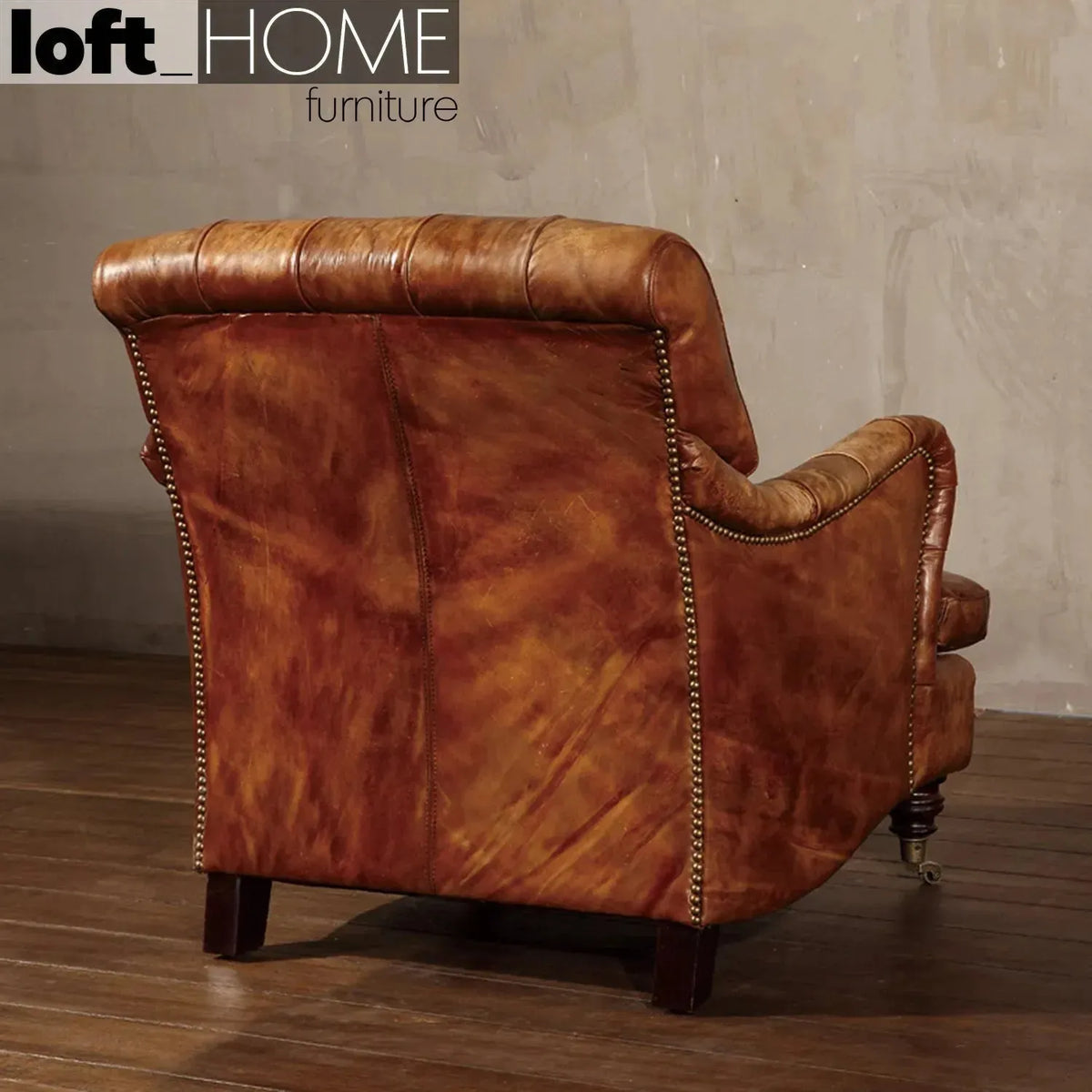 Vintage genuine leather 1 seater sofa rino with context.