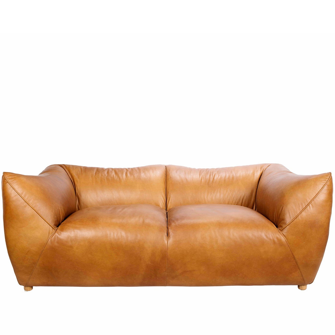 Vintage genuine leather 2 seater sofa beanbag in white background.