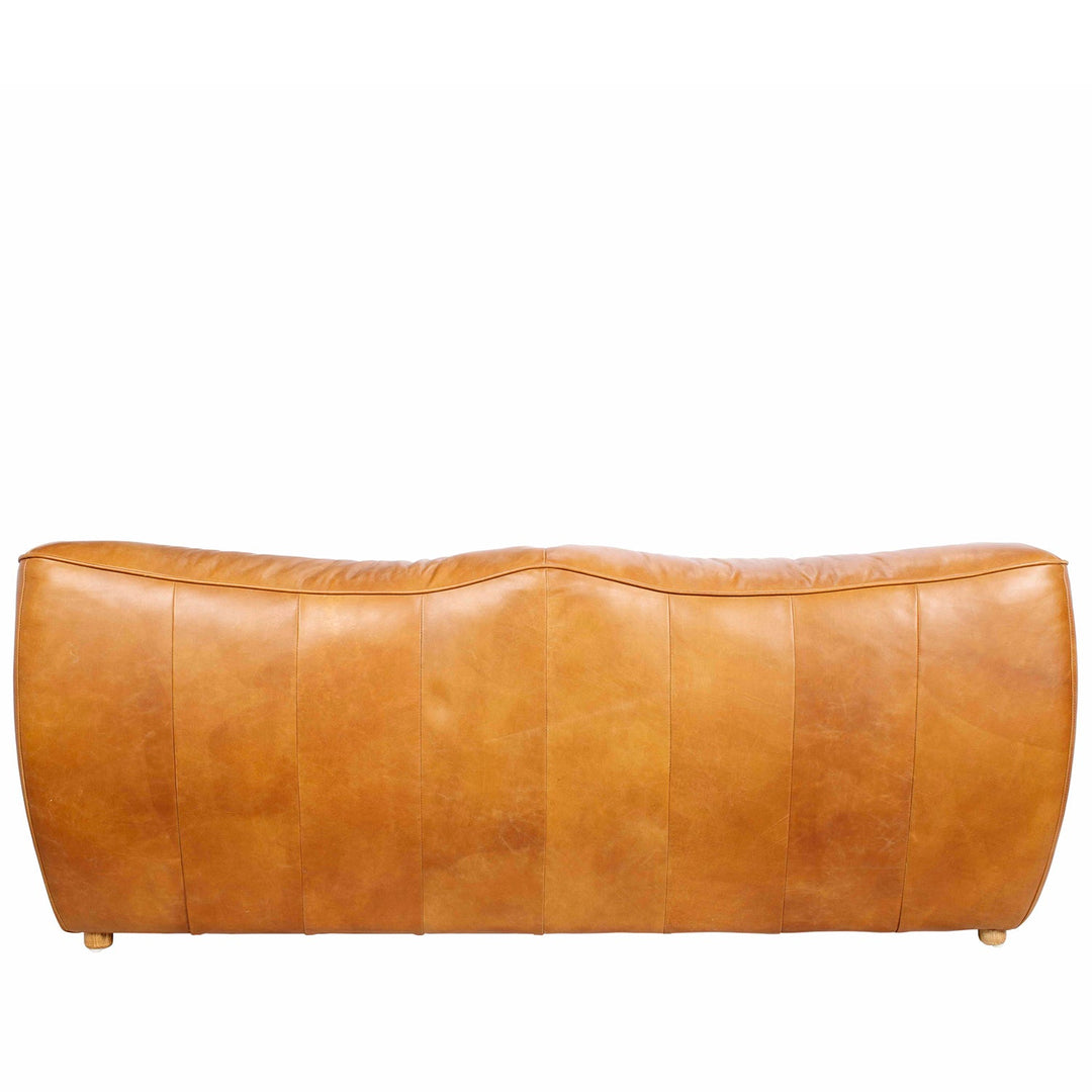 Vintage genuine leather 2 seater sofa beanbag in close up details.