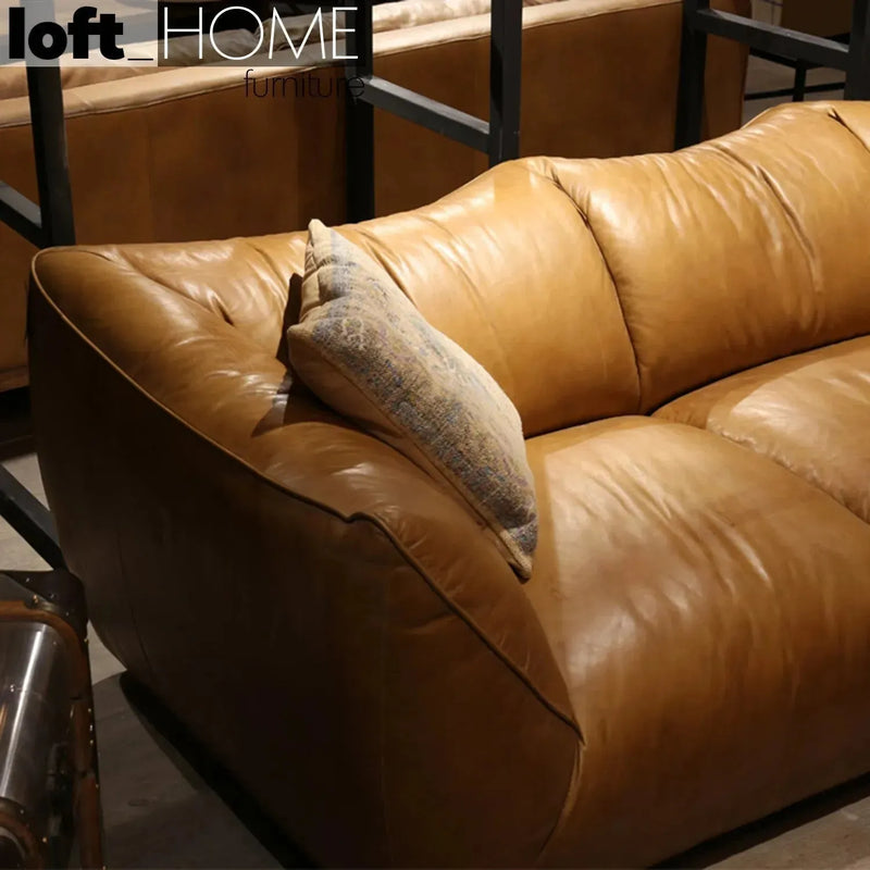 Vintage genuine leather 2 seater sofa beanbag in real life style.