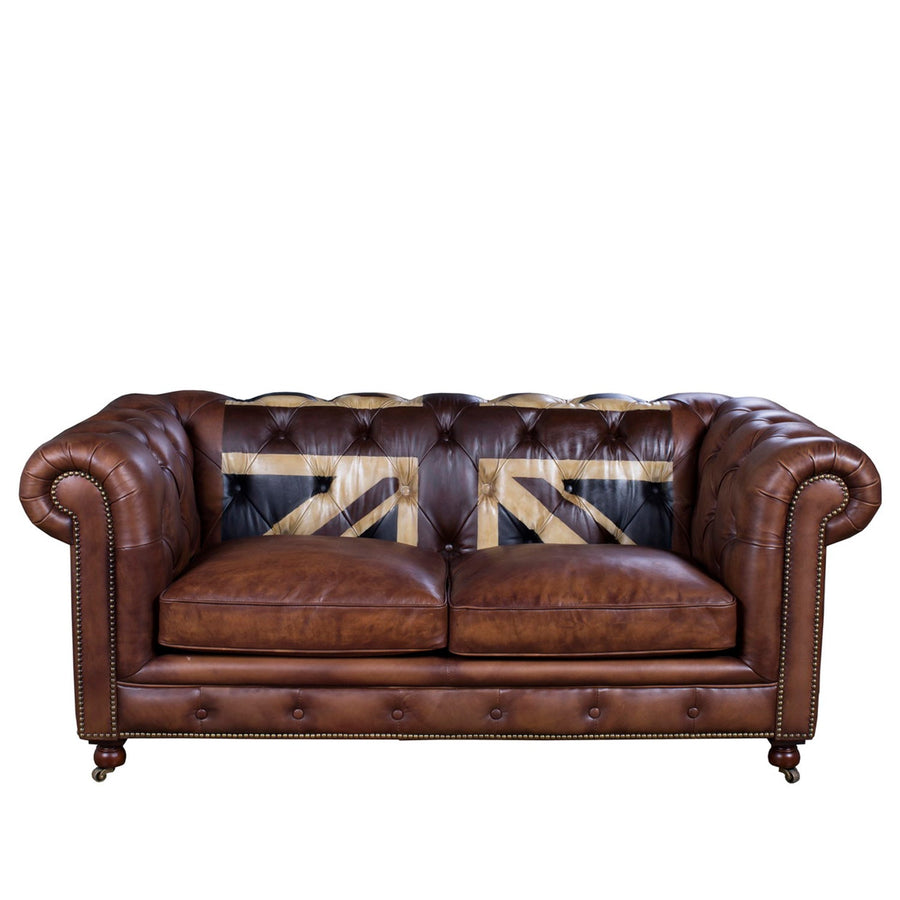 Vintage genuine leather 2 seater sofa chesterfield union jack in white background.