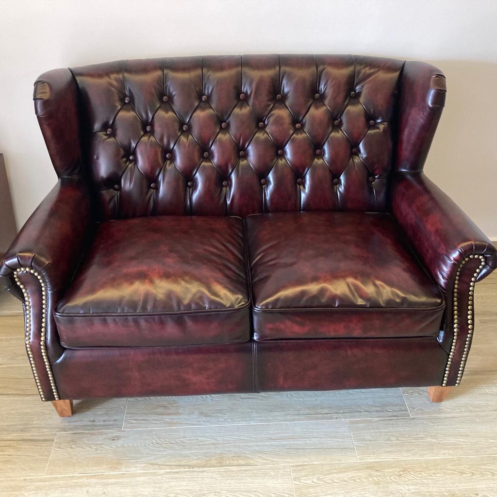 Vintage genuine leather 2 seater sofa franco in details.