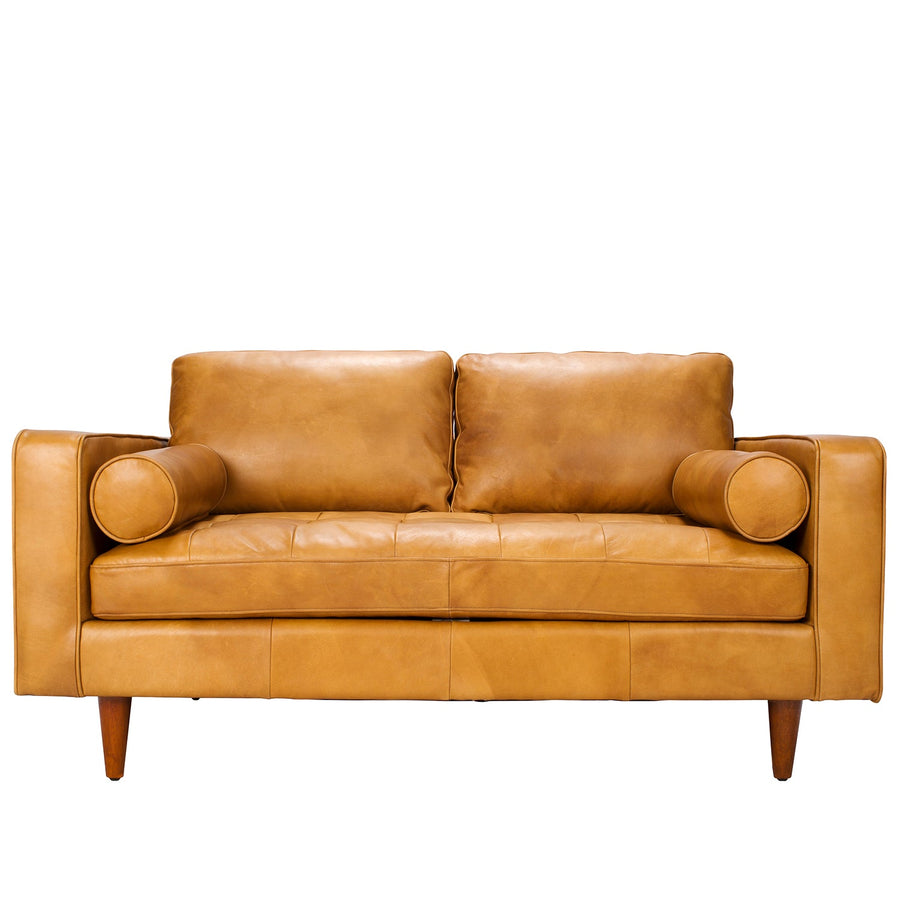 Vintage genuine leather 2 seater sofa olga in white background.
