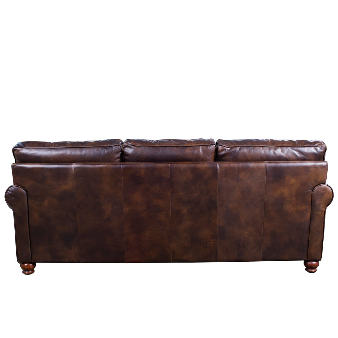 Vintage genuine leather 3 seater sofa antimas in real life style.