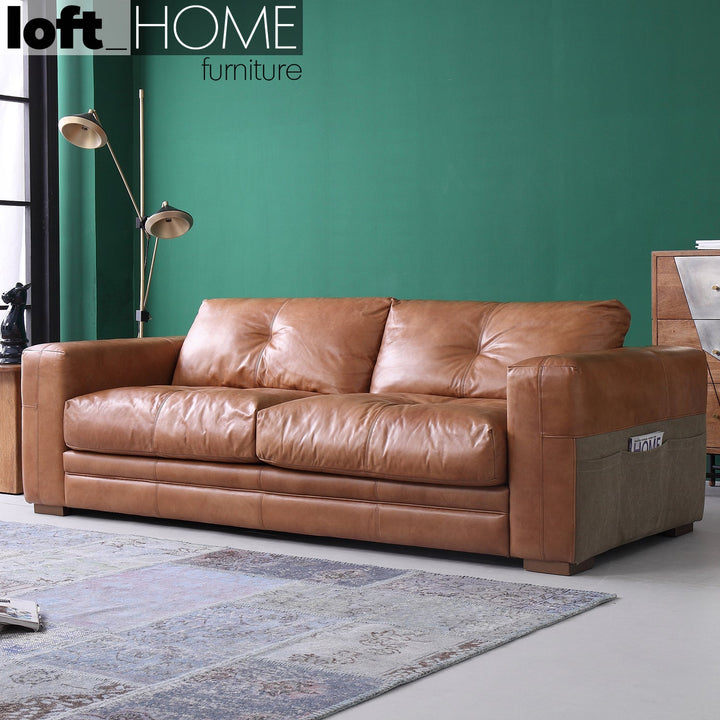 Vintage genuine leather 3 seater sofa canvas ter with context.