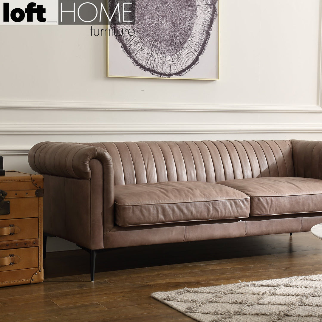 Vintage genuine leather 3 seater sofa elis in panoramic view.