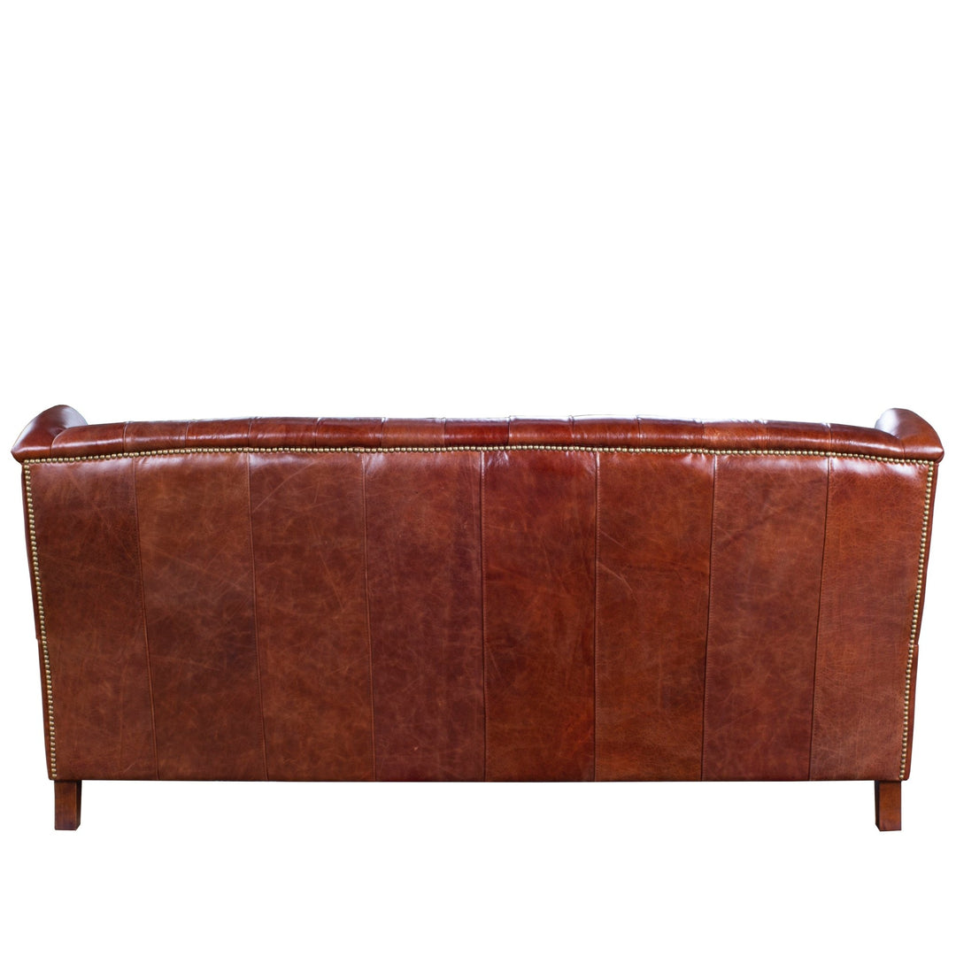 Vintage genuine leather 3 seater sofa franco in close up details.