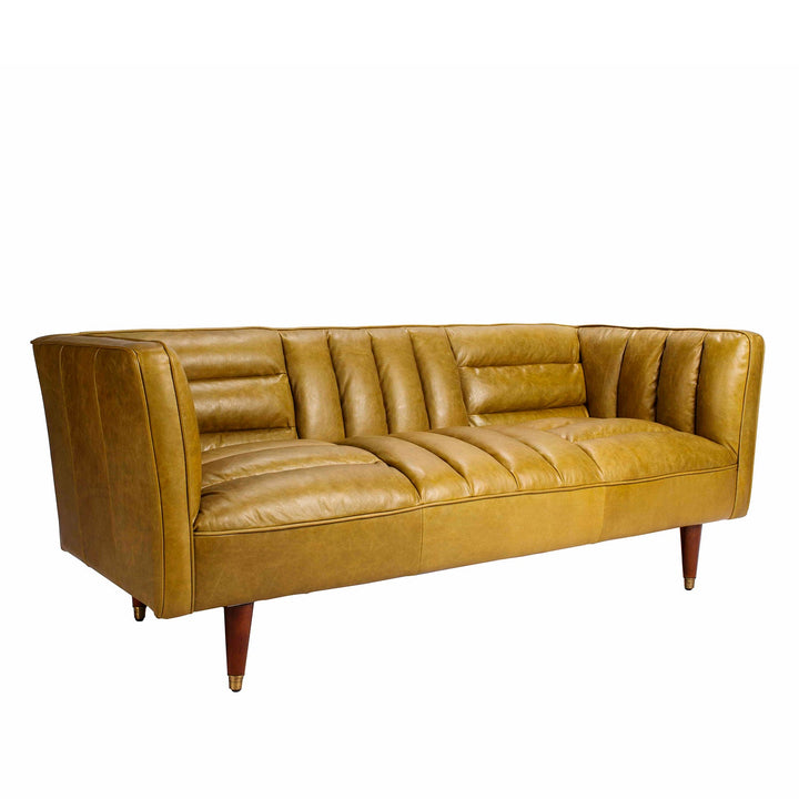 Vintage genuine leather 3 seater sofa lush with context.