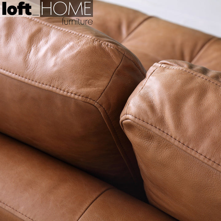 Vintage genuine leather 3 seater sofa olga in still life.