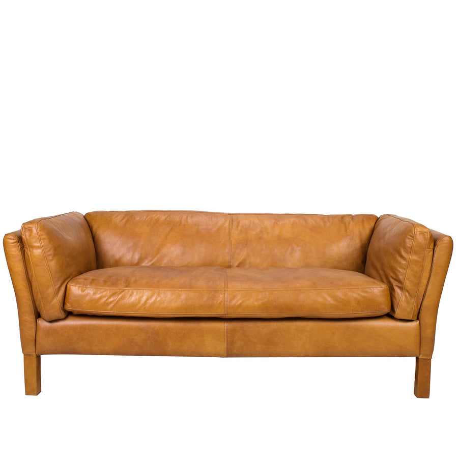 Vintage genuine leather 3 seater sofa reggio in white background.
