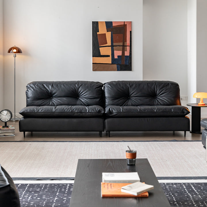Vintage genuine leather 3 seater sofa riga in still life.