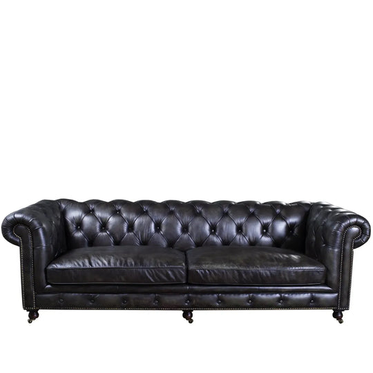 Vintage genuine leather 4 seater sofa chesterfield classic in white background.