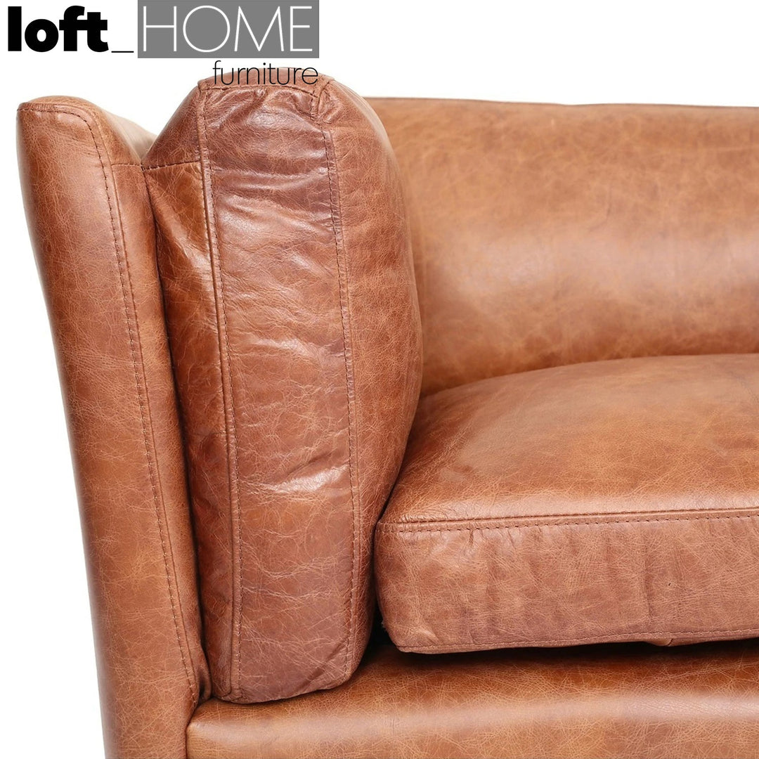 Vintage genuine leather 4 seater sofa reggio in close up details.