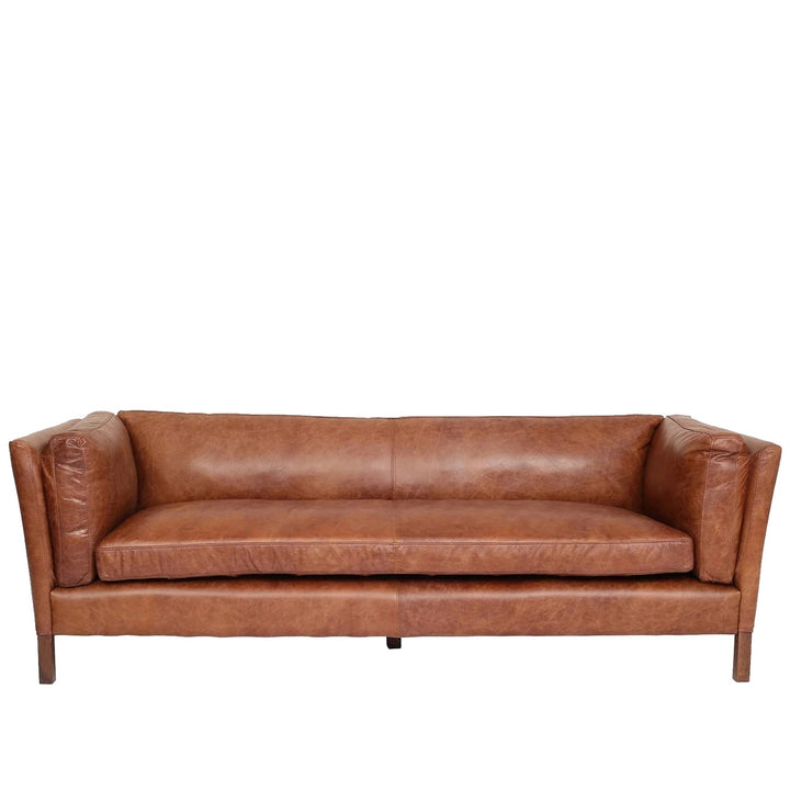 Vintage genuine leather 4 seater sofa reggio in white background.