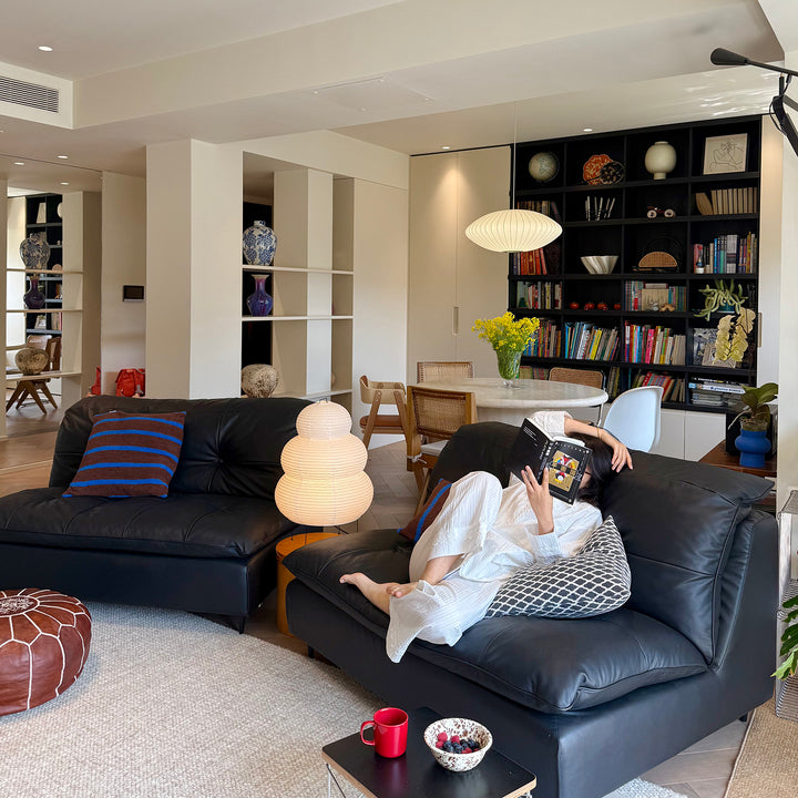 Vintage genuine leather 4 seater sofa riga in panoramic view.
