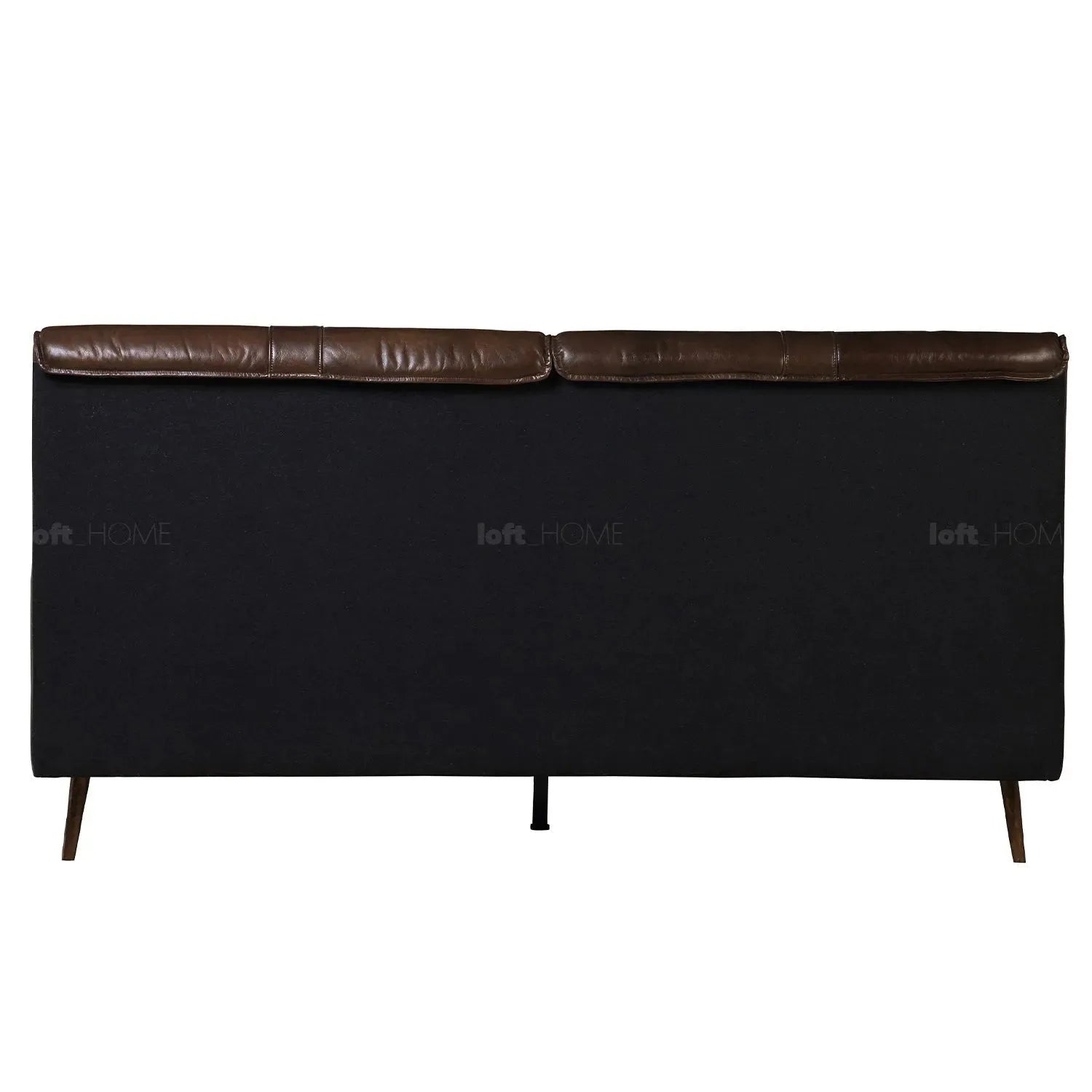 Vintage genuine leather bed frame saddleback in panoramic view.