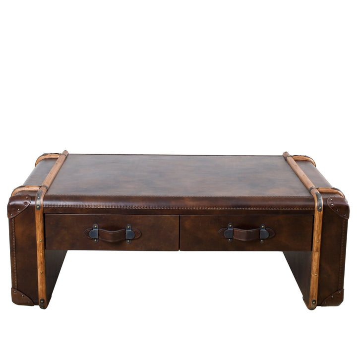 Vintage genuine leather coffee table richards' trunk in white background.