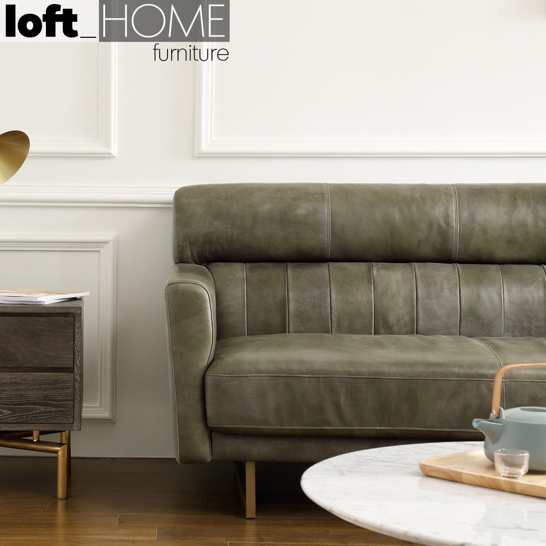 Vintage genuine leather l shape sofa green franco in details.