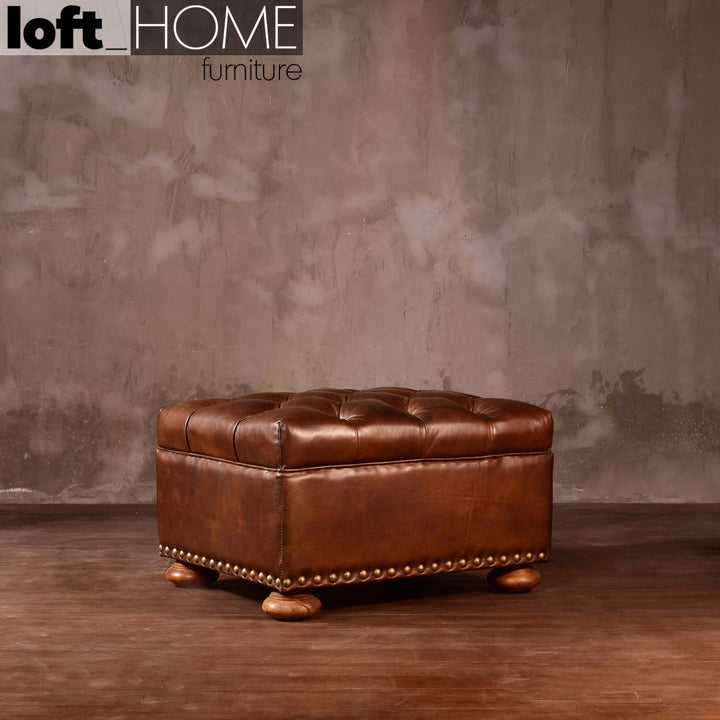 Vintage genuine leather ottoman chesterfield in real life style.