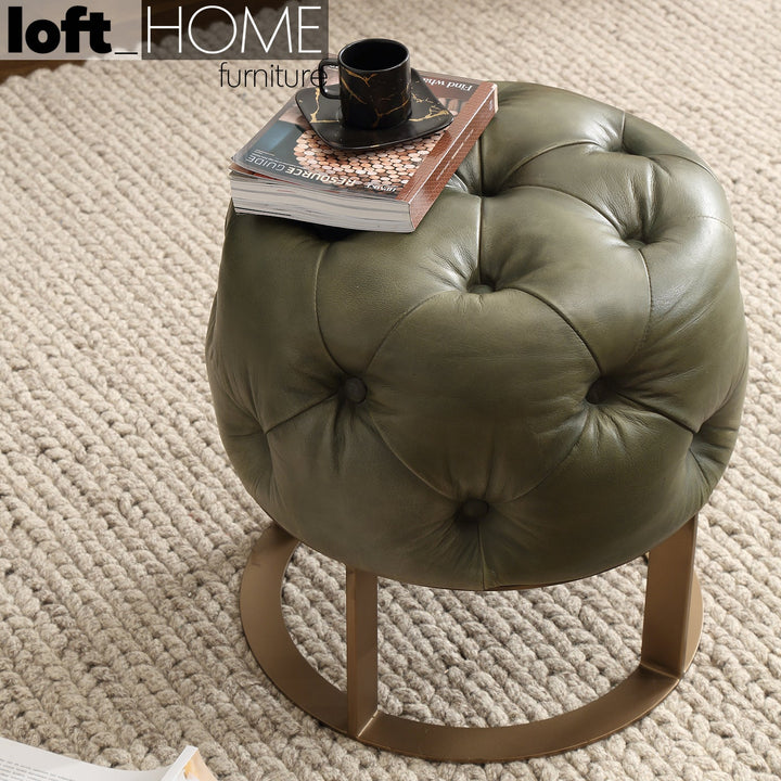 Vintage genuine leather ottoman green franco in real life style.