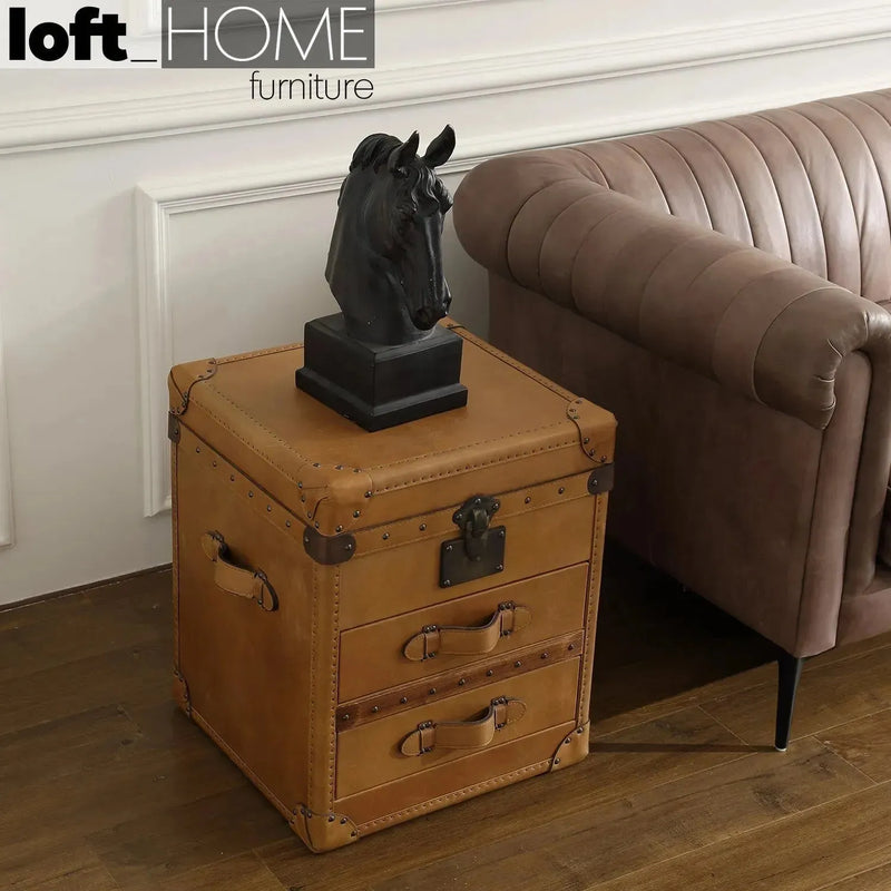 Vintage genuine leather side table nut ter trunk with context.