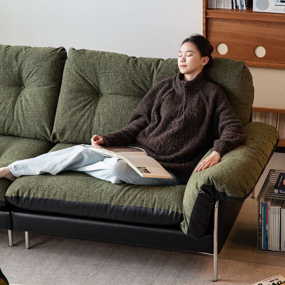 Vintage microfiber leather and fabric 3 seater sofa oasis in still life.