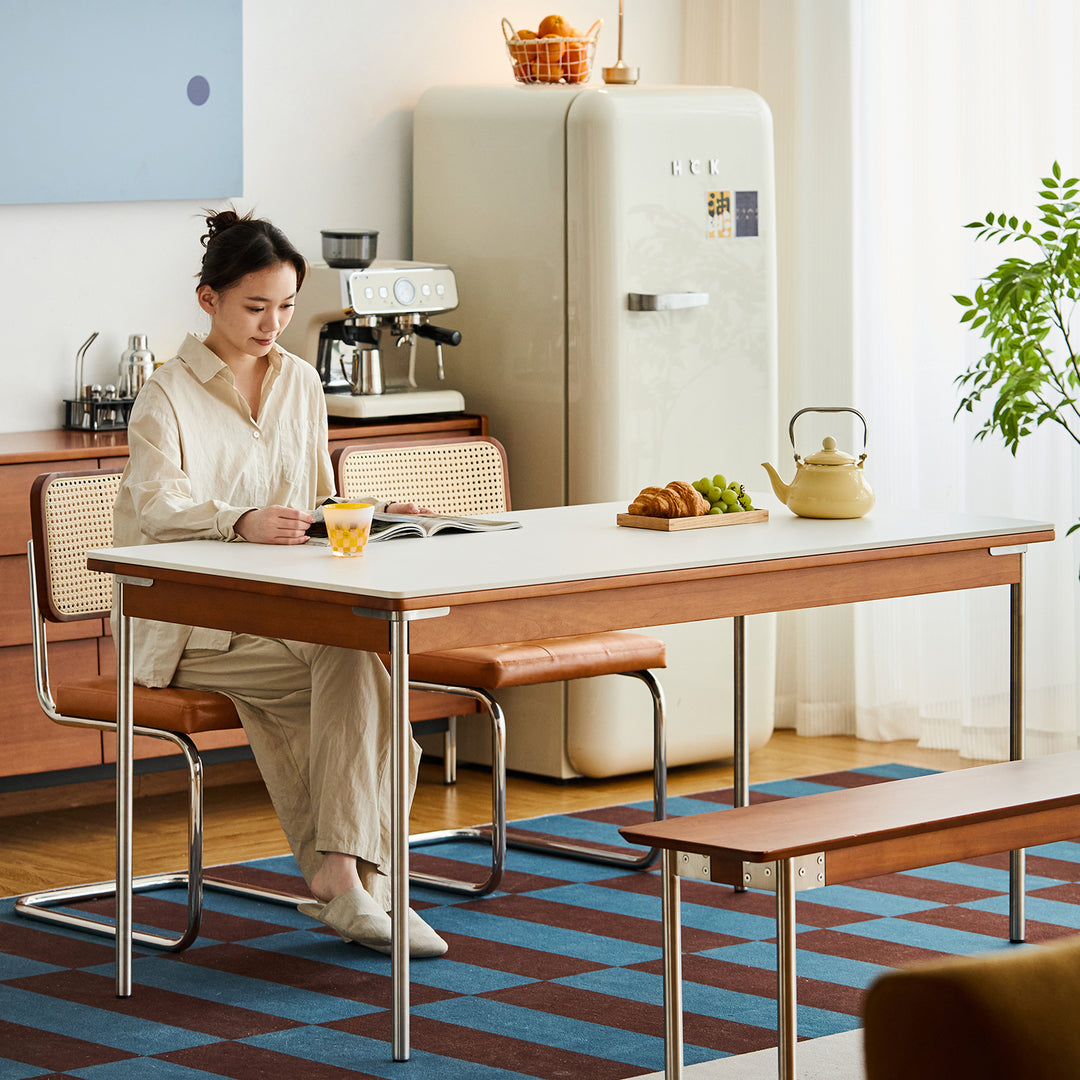 Vintage sintered stone boxwood dining table pinecone primary product view.