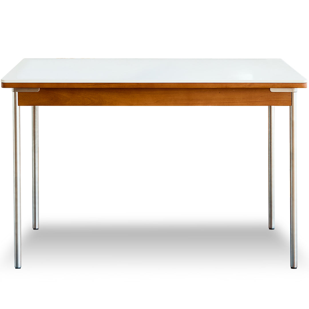 Vintage sintered stone boxwood dining table pinecone in white background.