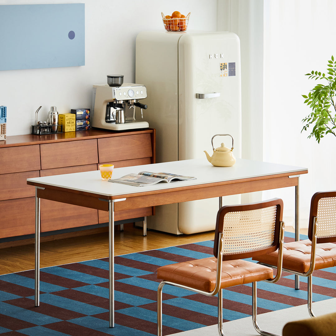Vintage sintered stone boxwood dining table pinecone in real life style.