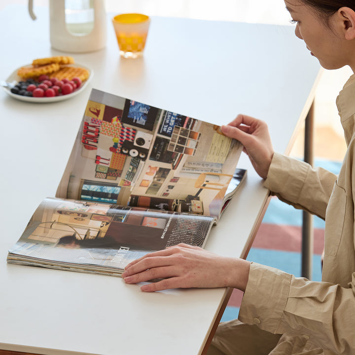 Vintage sintered stone boxwood dining table pinecone in details.