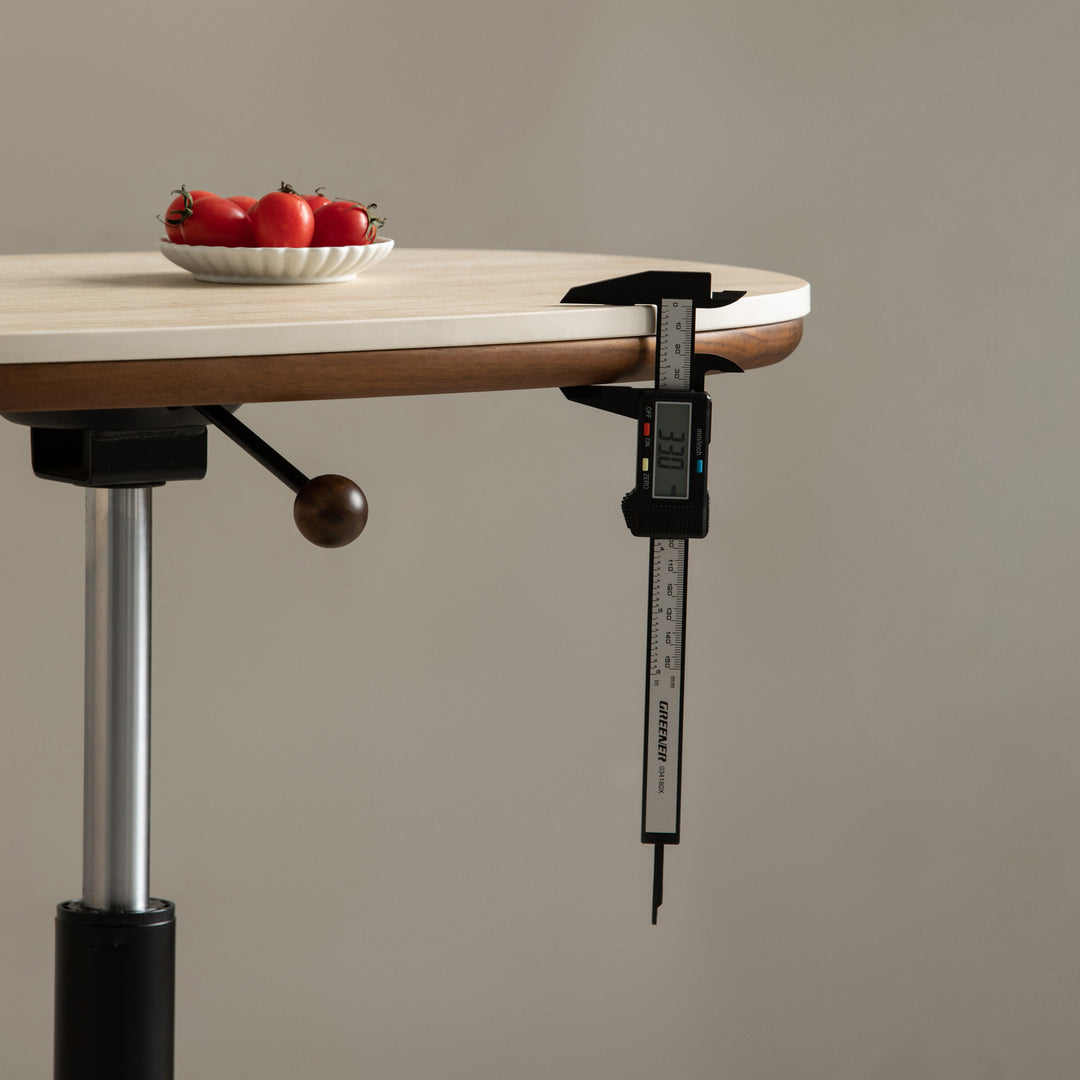 Vintage sintered stone height adjustable side table roman in real life style.