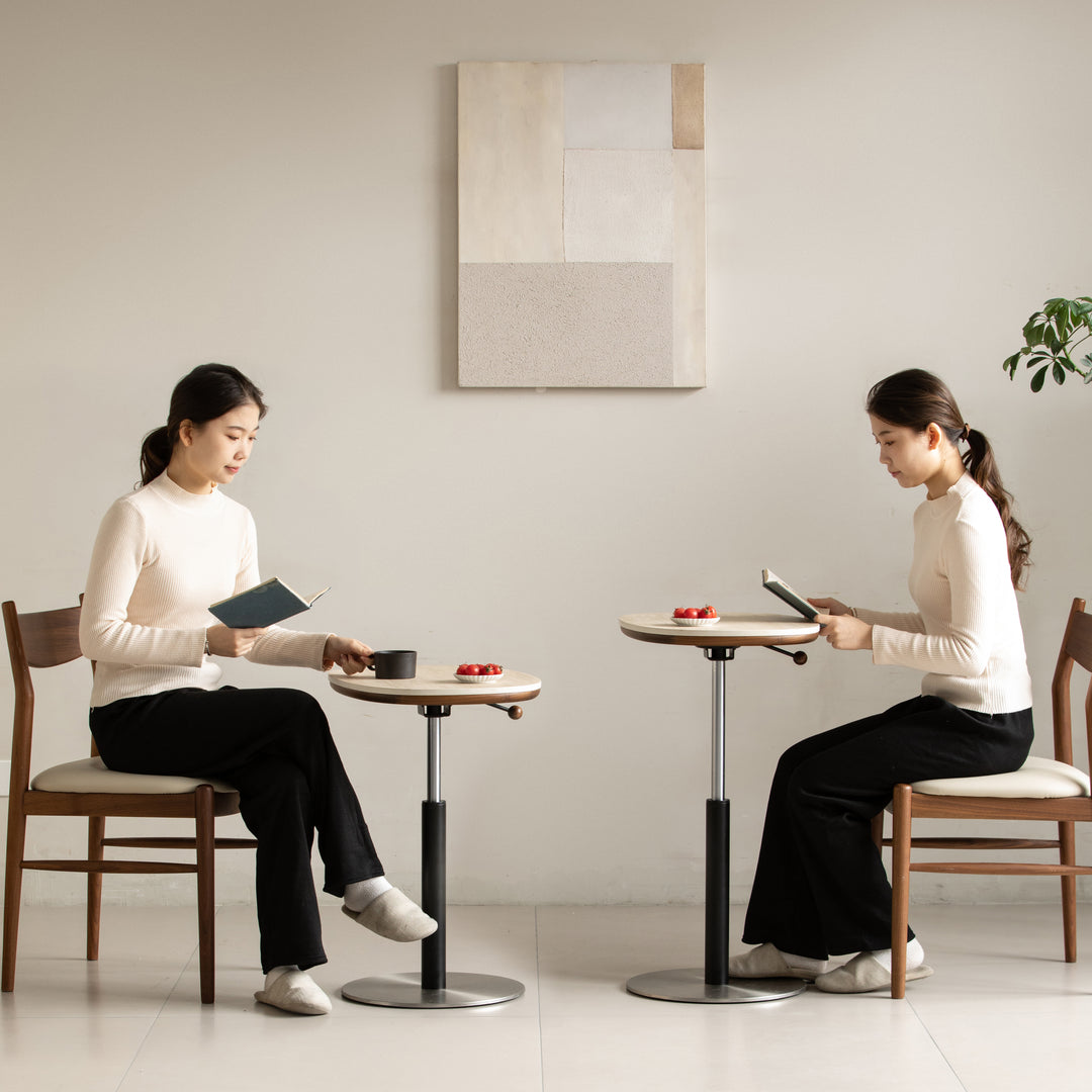 Vintage sintered stone height adjustable side table roman in close up details.