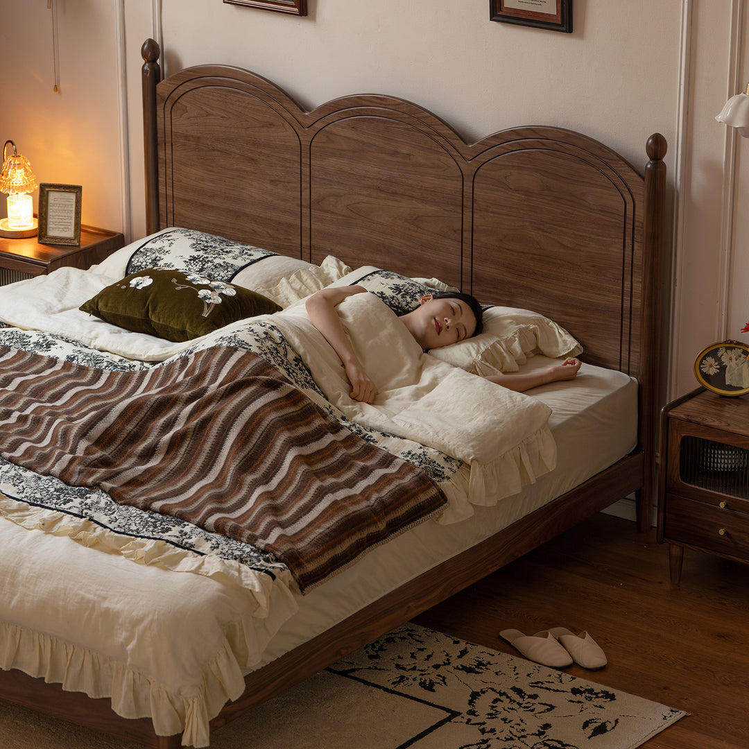 Vintage walnut wood bed midsummer with context.