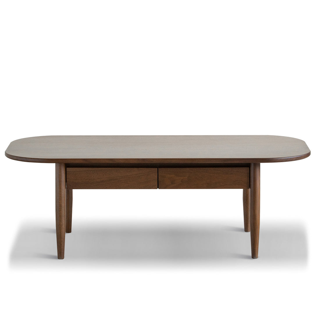 Vintage walnut wood coffee table vista in white background.