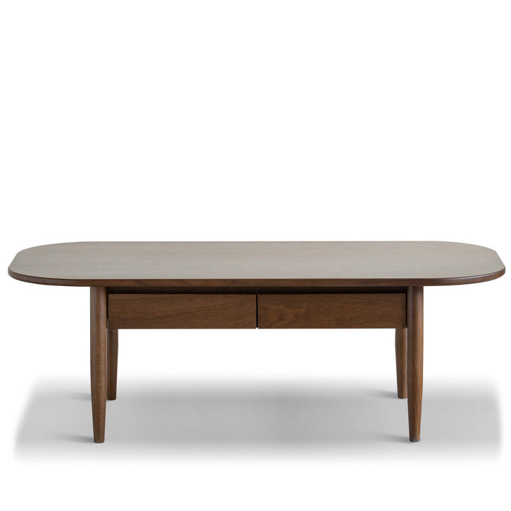 Vintage walnut wood coffee table vista in white background.