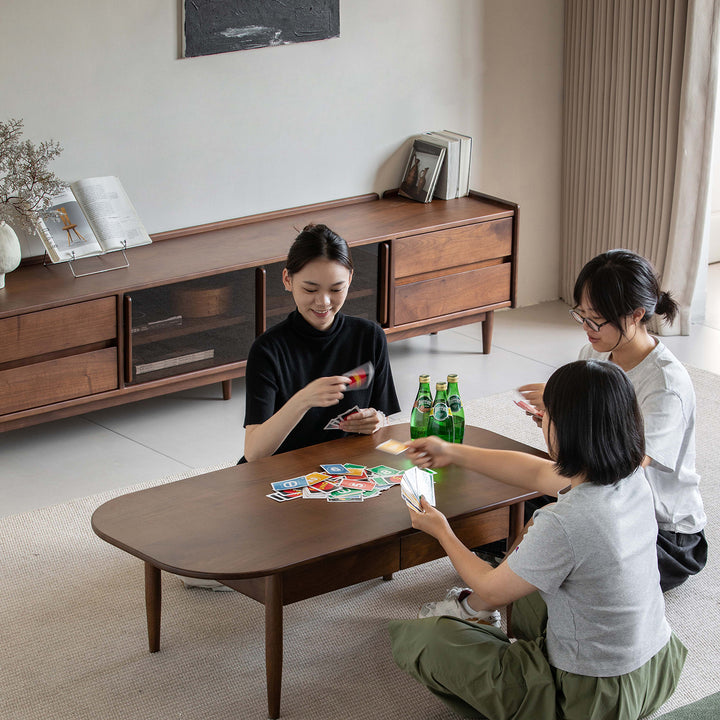 Vintage walnut wood coffee table vista with context.