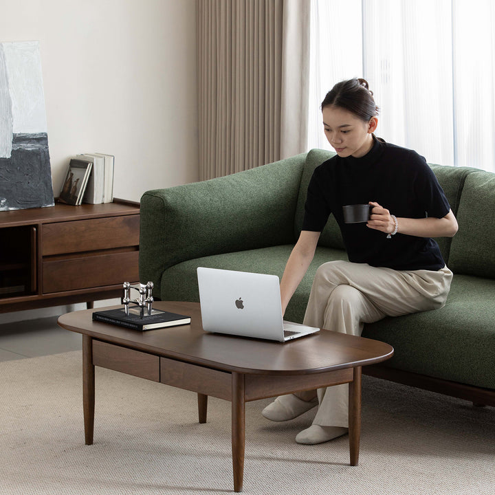 Vintage walnut wood coffee table vista in details.
