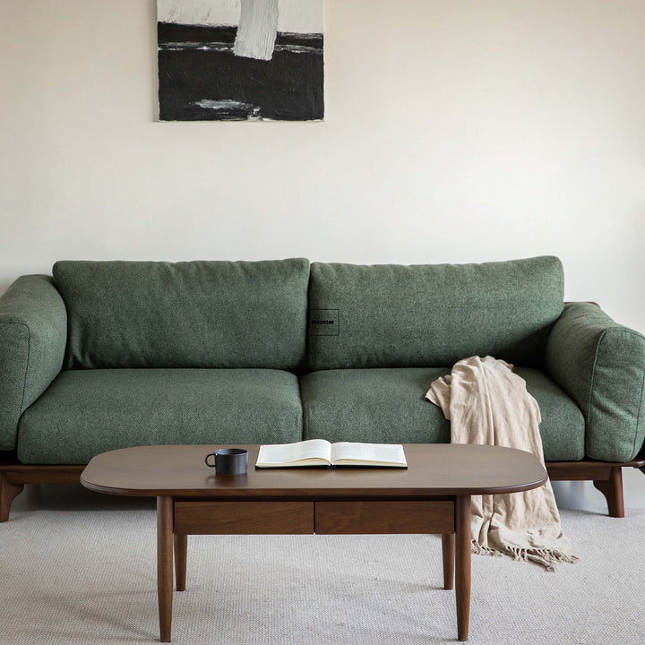 Vintage walnut wood coffee table vista in close up details.